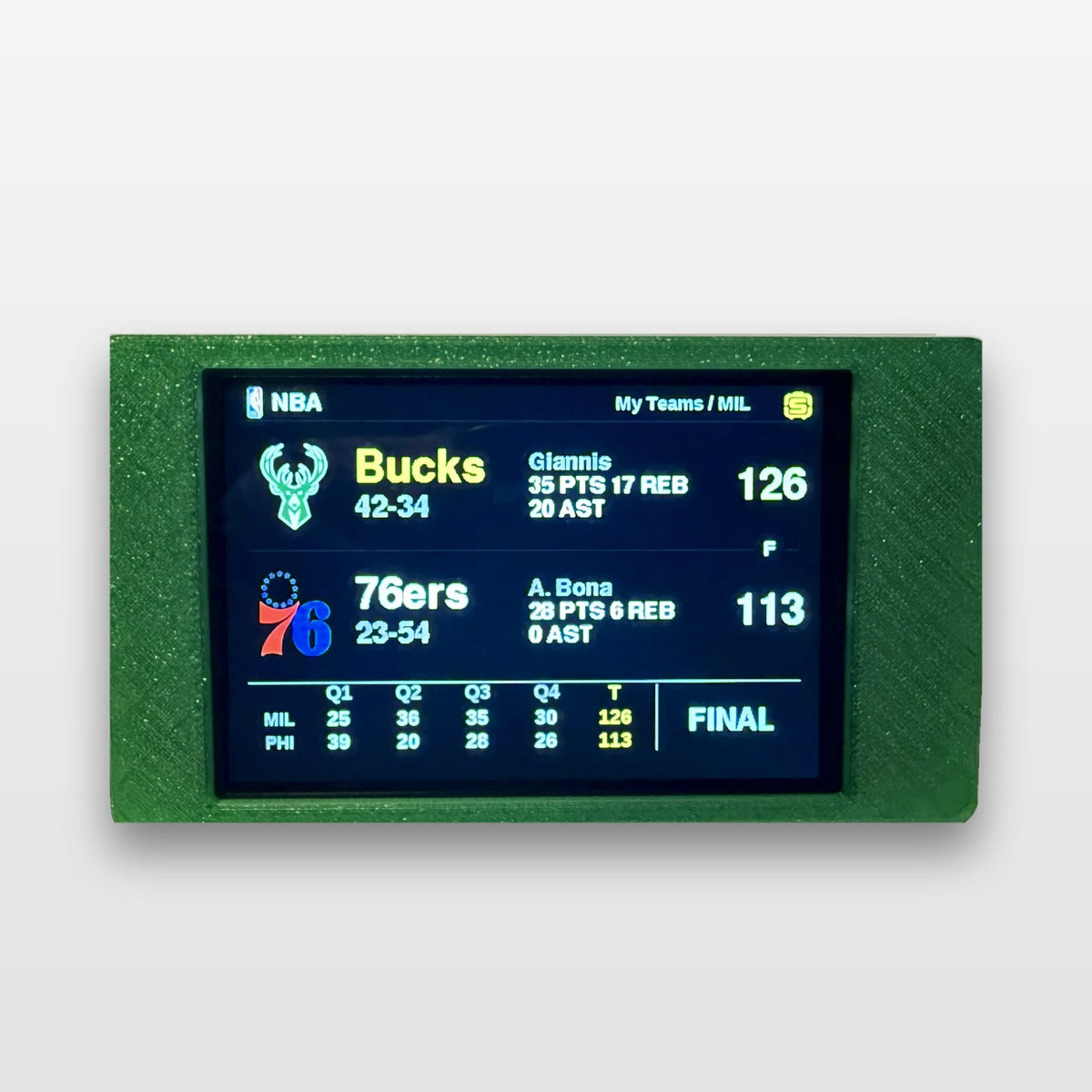 ScorePod in green showing the NBA My Teams screen with a Milwaukee Bucks final